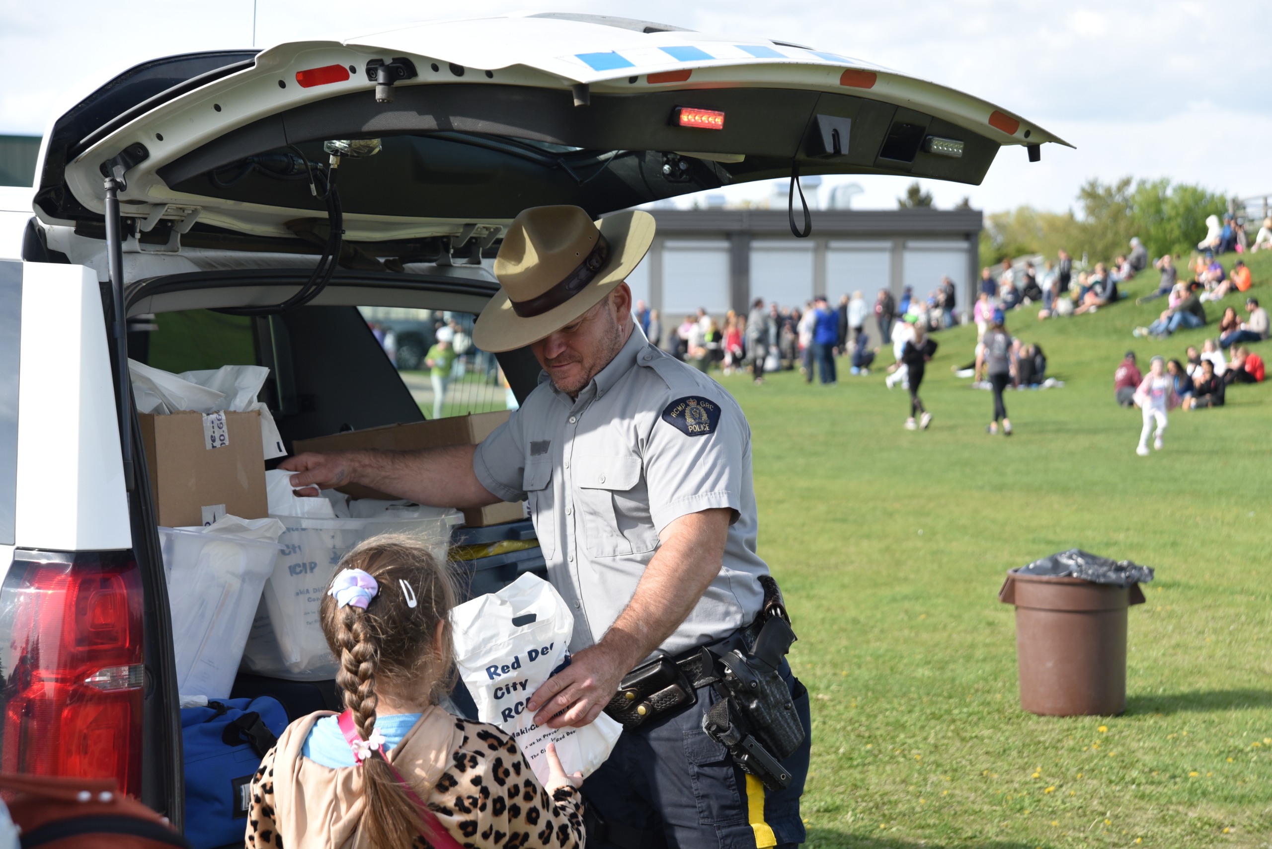 RCMP engaging with youth at a Red Deer community event.